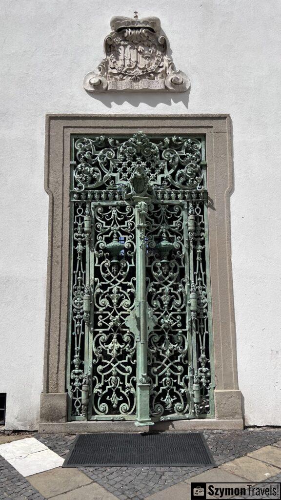 wide view of decorated wrought iron door in the courtyard of the Mikulov Castle