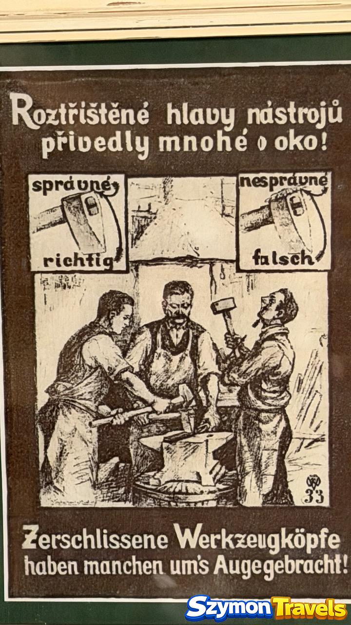 Historyczny plakat BHP dotyczący uszkodzonych młotków